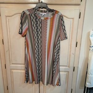 A BCBG generation swing type dress. Size L with a mixture of southwestern hues.
